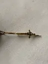 Marque-page_croix_cauris_en_bronze.webp