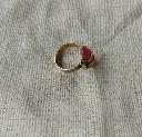 Bijou_en_bronze_et_pierre_rouge.webp