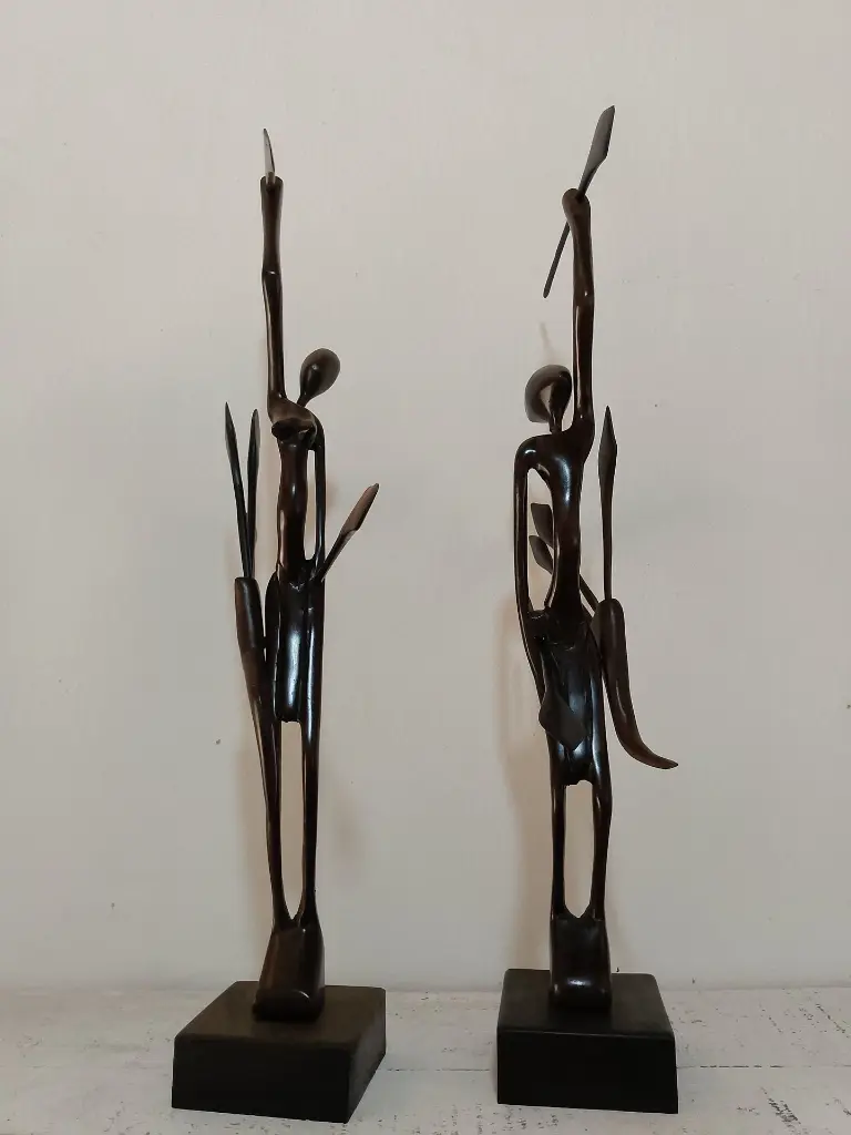 art_africain_couple_chasseurs_en_bois.webp